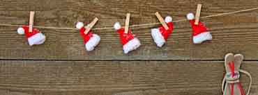 Santa Hats Attached To The Rope With Clothespin Cover Photo