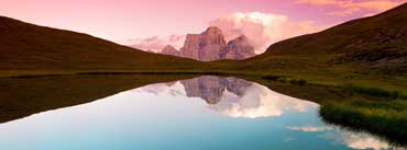 Reflection Of The Rock In The Lake Cover Photo