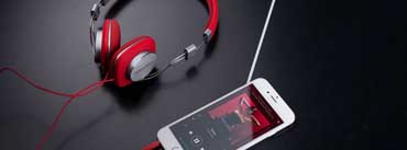 Red Headphone And White Iphone Cover Photo